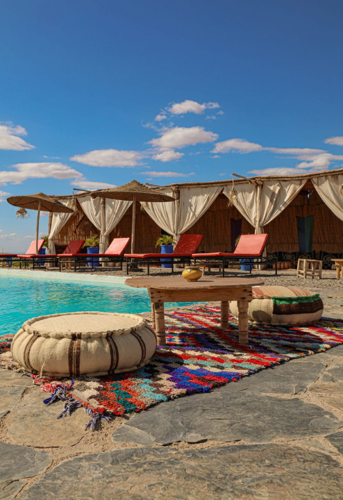 Luxury swimming pool at Oasis Sky camp in Agafay Desert near Marrakech Morocco
