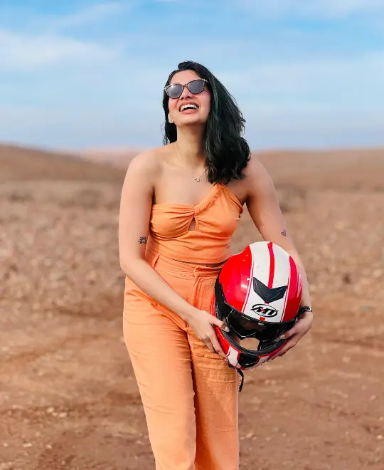 Happy woman enjoying luxury experience in Agafay desert near Marrakech