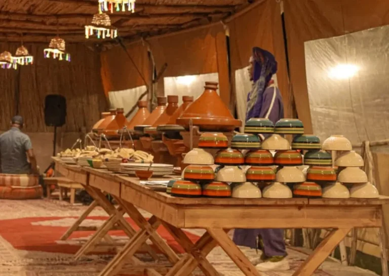 Meet Agafay Oasis Sky, a desert camp near Marrakech offering quad biking, camel rides, buggy adventures, sunset dinners, pool days and Moroccan hospitality. Traditional Moroccan desert dinner atmosphere at an Agafay camp