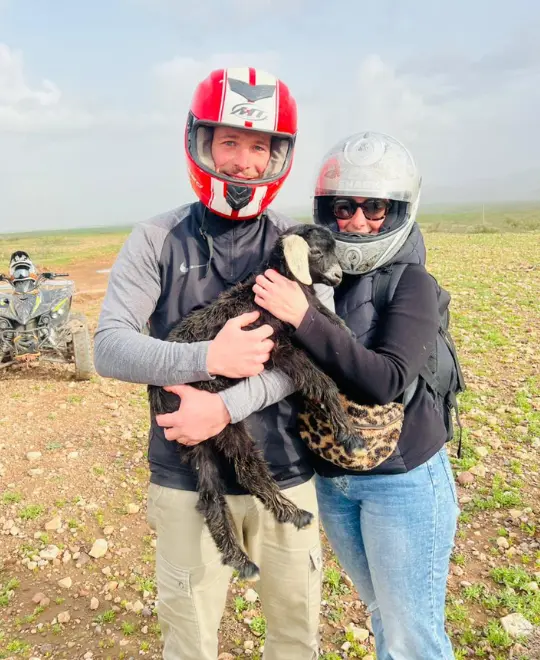 Two men and a woman enjoying a luxury experience in the Agafay desert near Marrakech