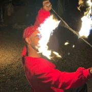 Fire performer during an Agafay Desert dinner and live show near Marrakech