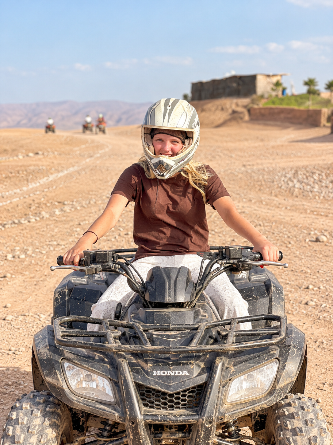 Guest riding a quad bike through the Agafay Desert near Marrakech