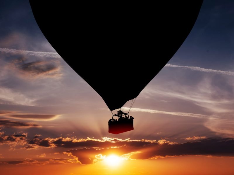 Hot air balloon silhouette in the sunset