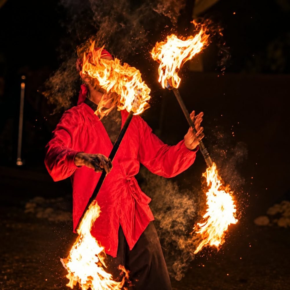Fire show during an evening dinner experience in the Agafay Desert near Marrakech