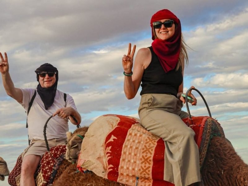 Chef preparing traditional Moroccan dishes in Agafay Desert luxury camp